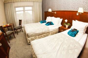 Фото номера Семейный номер Отель Hotel&amp;Spa Stary Dziwnów г. Дзивнув 5