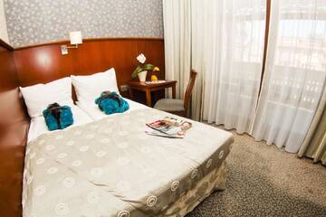 Фото номера Люкс с балконом Отель Hotel&amp;Spa Stary Dziwnów г. Дзивнув 5