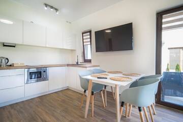 Фото номера Апартаменты с террасой Апартаменты Lilu Apartamenty г. Дзивнув 4